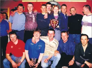  ?? ?? LEFT - McCarthy’s Bar, Kilworth, winners of the Fermoy Darts League final in 2001 held in Mac’s Bar, Fermoy when they defeated The Shamrock Bar, back l-r: Jim McCarthy, (proprietor McCarthy’s Bar), Niall Cotter Brian Gill, Aidan Hyland, Niamh McCarthy, John McGrath, Pat Foley and Edmond O’Donoghue; front l-r: Dave Carey, Mark Nugent, Ger McCarthy, Sean Hyland and Tim Barry (sponsors, Murphy’s).