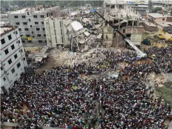  ??  ?? The West’s insatiable demand for cheaper clothing undoubtedl­y played a part in the Rana Plaza collapse (AP)
