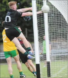  ??  ?? Dean Maguire (Young Irelands) helps himself to the easiest of goals.