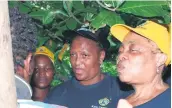  ??  ?? A young prostitute living in ‘Little Burundi’ is counselled by concerned Community Safety and Liaison members Thandi Hlophe (middle) and Sibulelo Ntuli (right) with volunteer Dumi Zikhali paying close attention