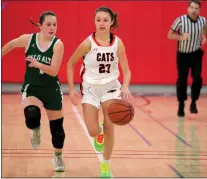  ?? ?? Los Gatos' Ella Rabitz (23) dribbles the ball against
Palo Alto's Kaella Peters (1) during a basketball game at Saratoga High School on Jan. 11,