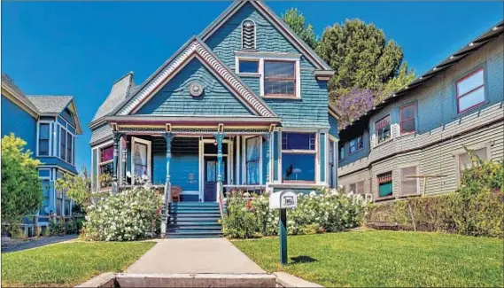  ?? Photograph­s by Mark Lee ?? ITS ANGELINO Heights address, on often-filmed Carroll Avenue, has given the so-called J.B. Winston House a higher profile.