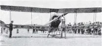  ?? PHOTO: OTAGO WITNESS ?? Pilot Philip Fowler (nicknamed “Shorty”) stretches to crank up his Avro plane on the Dunedin foreshore in January 1921.