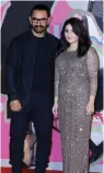  ?? — AP ?? Actors Aamir Khan and Zaira Wasim at the Hong Kong Film Awards on Sunday.