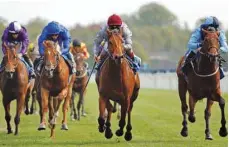  ?? (Racingfoto­s) ?? Andrea Atzeni (second from right) rides Lusail to victory in the Constant Security ebfstallio­ns.com Maiden Stakes in York, England, on Thursday.