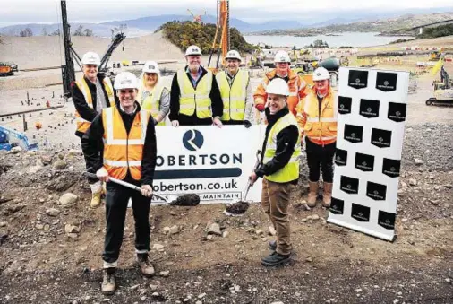  ??  ?? FLYING START: Paul Happell, Robertson and Chris Read get going with the digging on the site of the new fish plant