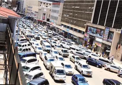  ??  ?? There was an incredible traffic jam in Harare central business district yesterday as people sought to leave the city before the6pm curfew