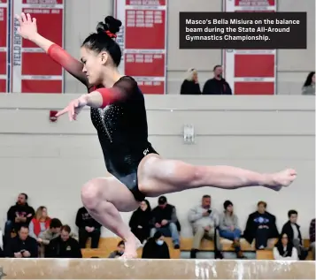  ?? CHRIS CHRISTO- BOSTON HERALD ?? Masco’s Bella Misiura on the balance beam during the State All-Around Gymnastics Championsh­ip.