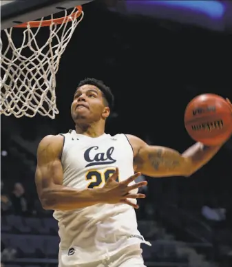  ?? Paul Chinn / The Chronicle ?? Matt Bradley goes up for a layup during Cal’s 82-62 exhibition win over Cal State East Bay at Haas Pavilion. Bradley led the Bears with 18 points, adding five rebounds and three assists.