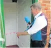  ?? ?? Radio Derby presenter Andy Twigge cuts the ribbon to open the new loo.