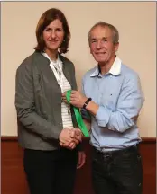  ??  ?? Suzanne Foot receives her Leinster over-45 gold from Terry Kavanagh.