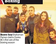  ??  ?? Brave boy Shahzman Parnez claims Duries BC’s first win of the boxing season