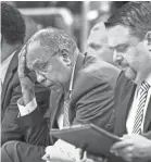  ?? MARK ?? Memphis head coach Tubby Smith (middle) during second half action against USF in their AAC first round tournament game on March 8. WEBER/THE COMMERCIAL APPEAL