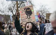  ??  ?? PROTEST: Thousands, including many families, took to the streets to protest at the homeless crisis, with over 10,000 people now living in emergency accommodat­ion. (Right) Damien Dempsey sang at the demonstrat­ion in Dublin city centre. PHOTOS: Mark Condren