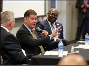  ?? (Arkansas Democrat-Gazette/Thomas Metthe) ?? U.S. Secretary of Labor Marty Walsh (center) speaks as Little Rock Mayor Frank Scott Jr. (right) listens during a visit to Philander Smith College on Wednesday.