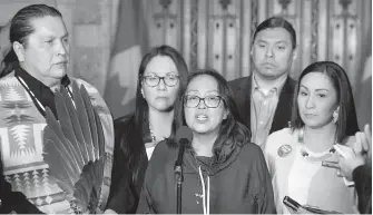  ??  ?? Backed by relatives and supporters, Debbie Baptiste, the mother of Colten Boushie, speaks to reporters in the foyer of the House of Commons on Tuesday.