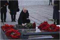  ?? ?? Russian President Vladimir Putin lays a bunch of flowers at the memorial of Marshal of the Soviet Union Vasily Chuikov while attending commemorat­ions marking the 80th anniversar­y of the Soviet victory in the battle of Stalingrad in Volgograd on Thursday. — ap