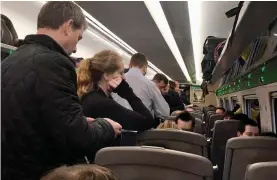  ??  ?? Crammed: Passengers still aren’t guaranteed to get a seat