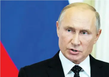  ?? ALEXANDER ZEMLIANICH­ENKO / AP PHOTO / POOL ?? Russian President Vladimir Putin has increased his influence in Central Asia with a pledge to protect the border of Tajikistan, Afghanista­n’s neighbour to the northeast.