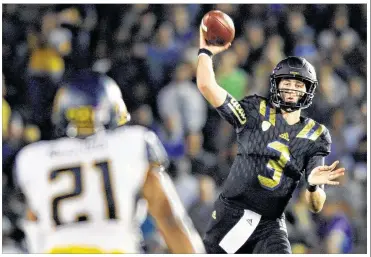  ?? WALLY SKALIJ / LOS ANGELES TIMES/TNS ?? In Thursday night’s 40-24 win at the Rose Bowl over Cal, UCLA freshman quarterbac­k Josh Rosen completed 34-of-47 passes for 399 yards, three TDs and no intercepti­ons.