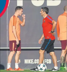  ?? FOTO: PEP MORATA ?? Vermaelen y Valverde durante una sesión de entrenamie­nto esta temporada