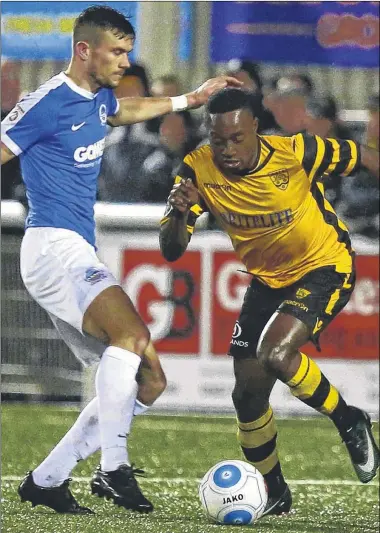  ?? FM4633157 Buy this picture from kentonline.co.uk ?? Jamar Loza shows quick feet as he evades attempts from the visitors to win back possession