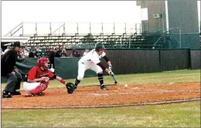  ?? MIKE CAPSHAW ENTERPRISE-LEADER ?? Lincoln sophomore Christian Crittenden tries to execute a squeeze play in an attempt to score Jacob Anderson from third base, but the bunt rolled foul down the third base line.