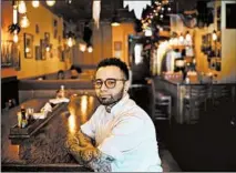  ?? E. JASON WAMBSGANS/CHICAGO TRIBUNE ?? David Rodriguez, owner of Whisk, a restaurant in the Ukrainian Village neighborho­od, is a DACA recipient who employs about 15 workers.