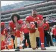  ?? MARCIO JOSE SANCHEZ — THE ASSOCIATED PRESS FILE ?? In this file photo, San Francisco quarterbac­k Colin Kaepernick, left, and safety Eric Reid kneel during the national anthem before an NFL football game against the Dallas Cowboys in Santa Clara Reid says his Christian faith is the reason why he joined...