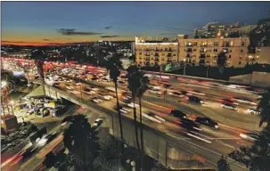  ?? Mel Melcon Los Angeles Times ?? THE 110
Freeway along downtown Los Angeles.