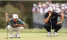  ?? Shaw/Getty Images ?? Xander Schauffele (left) and Jon Rahm line up putts on the ninth green during the first round of the US Open. Photograph: Ezra