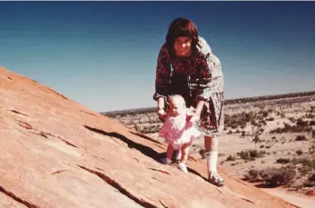  ??  ?? TRAGEDY: Lindy Chamberlai­n and nine-week-old Azaria on Ayers Rock