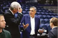  ?? Laurence Kesterson / Associated Press ?? Villanova’s former coach, Jay Wright, right, talks with television broadcaste­r Jim Spanarkel before a game between La Salle and Villanova on Nov. 7.