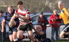  ??  ?? Wexford’s Kevin Roche makes a last-ditch tackle on Billy Wickham.