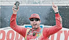  ?? DONALD PAGE/GETTY ?? Kyle Busch celebrates after winning the NASCAR Cup Series race at Bristol Motor Speedway on Sunday.