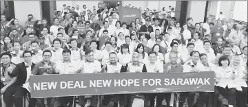  ??  ?? Muhyiddin (front, fifth right), flanked by Chong on his right and Baru, with other PH Sarawak members after the launch of PH Sarawak manifesto.