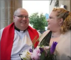  ??  ?? Rev Conor O’Reilly and his wife Mollie outside St. Iberius Church.