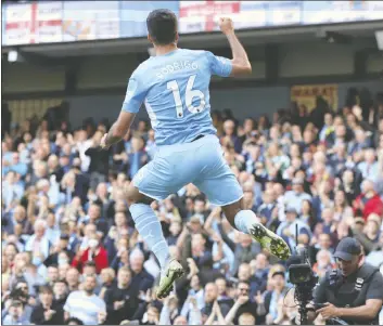  ?? — REUTERS ?? Manchester City's Rodri celebrates scoring his team's third goal against Newcastle.