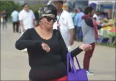  ?? PETE BANNAN - DIGITAL FIRST MEDIA ?? Lisa WIlson of Chester grooves to the sounds at Chesterfes­t 2018 Saturday on the grounds of Talen Energy Stadium along the Delaware Riverfront.