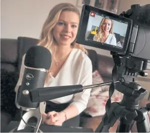  ??  ?? Lauren set up YouTube channel Scottish Murmurs after she left university, and is now making £1,000 a month from it Photograph: Stewart Atwood