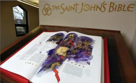  ?? HAMILTON SPECTATOR FILE PHOTOS ?? The Diocese of Hamilton’s St. John’s Bible Heritage Edition. The diocese will receive all 7 volumes of the Bible in 2017.