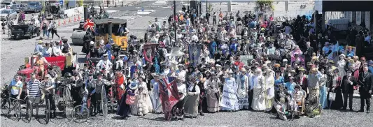  ??  ?? All together . . . A contingent of Victorian era members gather for the grand photo after the parade.