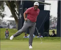  ?? MARCIO JOSE SANCHEZ - THE ASSOCIATED PRESS ?? Jon Rahm, of Spain, reacts to his putt on the 17th green during the final round of the U.S. Open Golf Championsh­ip, Sunday, June 20, 2021, at Torrey Pines Golf Course in San Diego.