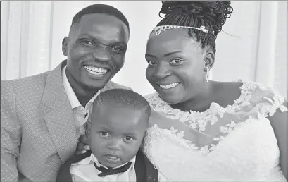  ??  ?? B-Metro Sports Reporter Fungai Muderere and his bride Oabile Makhurane and their two-year-old son Nkosinhle during their wedding at Homestead Conference Centre in Bulawayo yesterday