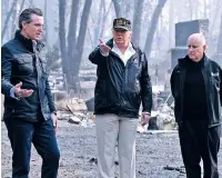  ??  ?? President Donald Trump talks with California Gov.-elect Gavin Newsom, left, and Gov. Jerry Brown on Saturday during a visit to a neighborho­od impacted by the wildfires in Paradise, Calif.