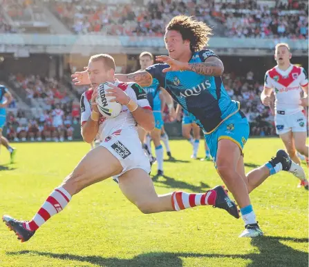  ?? Picture: GETTY IMAGES ?? Kevin Proctor (right) has done enough to win back the Titans captaincy – though a few absentees helped.