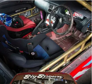 ??  ?? INTERIOR SEATS: Racetech STEERING WHEEL: Nardi INSTRUMENT­ATION: GReddy oil-, water-, and exhaust-temperatur­e gauges EXTRA: Dildo shifter, custom switch panel