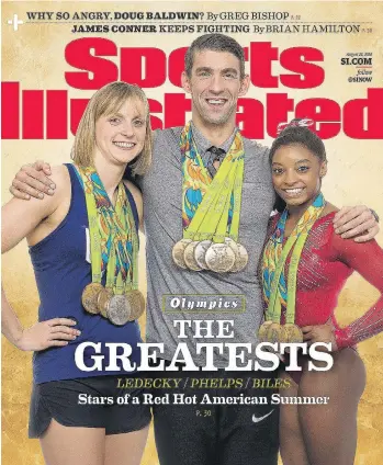  ?? SPORTS ILLUSTRATE­D ?? U.S. Olympian Michael Phelps, seen with Katie Ledecky, left, and Simone Biles, sports a pair of Nike sweatpants on the cover of Sports Illustrate­d. He is sponsored by Under Armour.