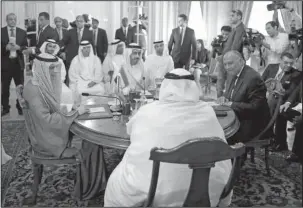  ?? The Associated Press ?? MEETING: Seated from left to right at table, Saudi Foreign Minister Adel al-Jubeir, United Arab Emirates Foreign Minister Abdullah bin Zayed al-Nahyan, Egyptian Foreign Minister Sameh Shoukry, and Bahraini Foreign Minister Khalid bin Ahmed al-Khalifa...