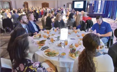  ?? Dan Watson/The Signal ?? Attendees follow along with a slideshow presentati­on during the 2019 Employment Law Update event presented by the Santa Clarita Valley Chamber of Commerce at the Hyatt Regency Valencia on Thursday.